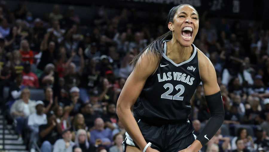 A'ja Wilson #22 of the Las Vegas Aces reacts after making a basket and drawing a foul against the Indiana Fever in the third quarter of their game at Michelob ULTRA Arena on May 25, 2024 in Las Vegas, Nevada.