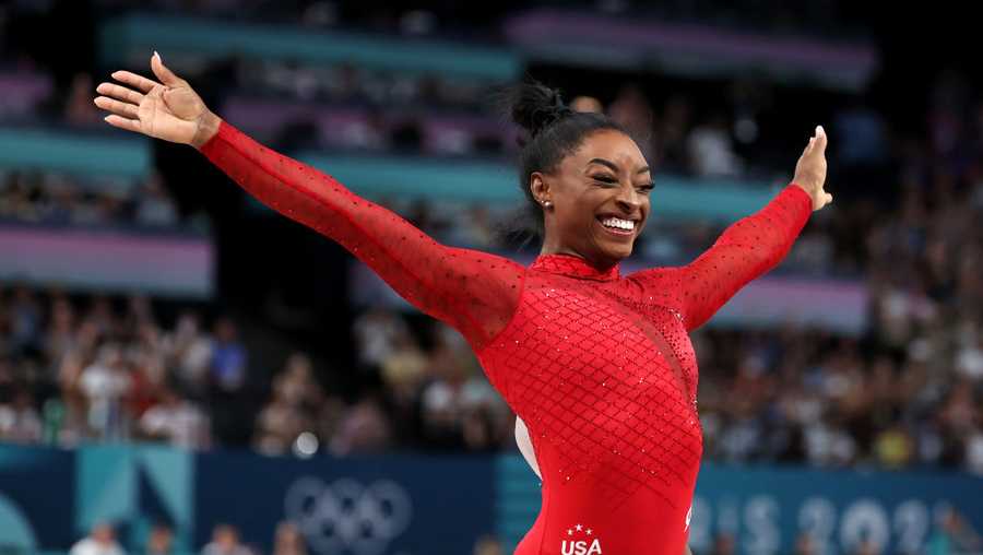 Simone Biles of Team United States celebrates after finishing her routine during the Artistic Gymnastics Women's Vault Final on day eight of the Olympic Games Paris 2024 at Bercy Arena on August 03, 2024 in Paris, France. (Photo by Julian Finney/Getty Images)