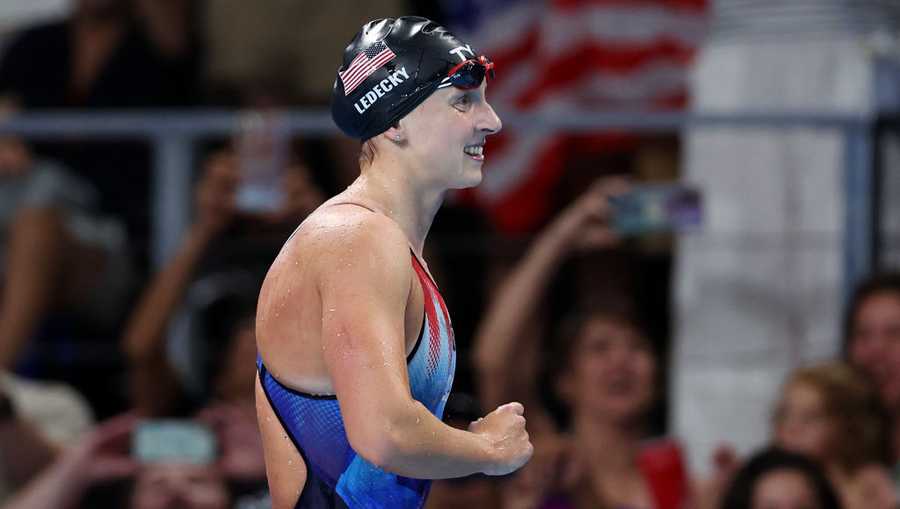 NANTERRE, FRANCE - AUGUST 03: Katie Ledecky of Team United States celebrating winning gold in the Women's 800m Freestyle Final on day eight of the Olympic Games Paris 2024 at Paris La Defense Arena on August 03, 2024 in Nanterre, France. (Photo by Quinn Rooney/Getty Images)