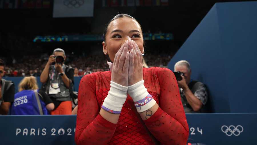 Sunisa Lee of Team United States celebrates winning the Bronze medal during the Artistic Gymnastics Women's Uneven Bars Final on day nine of the Olympic Games Paris